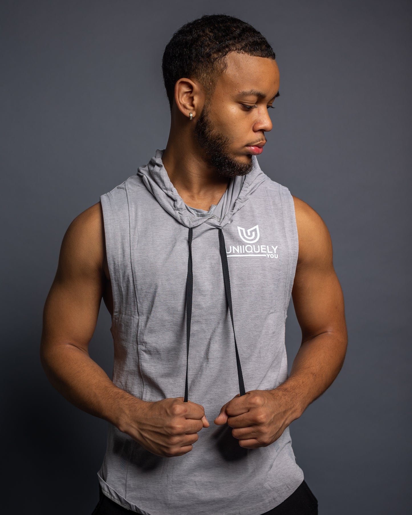 Men’s grey sleeveless gym hoodie with drawstring hood, slim athletic fit, breathable workout top