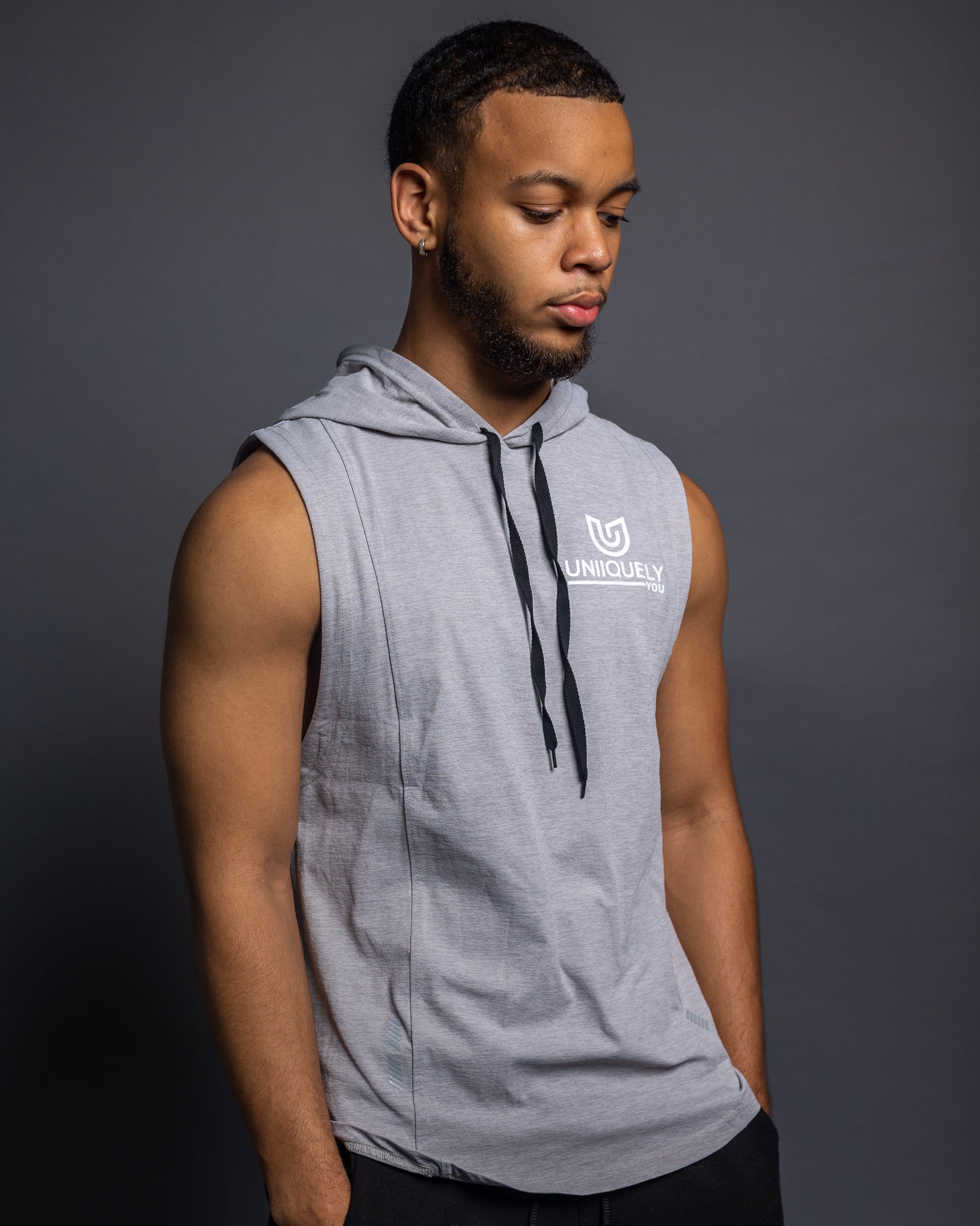 Men’s grey sleeveless gym hoodie with drawstring hood, slim athletic fit, breathable workout top