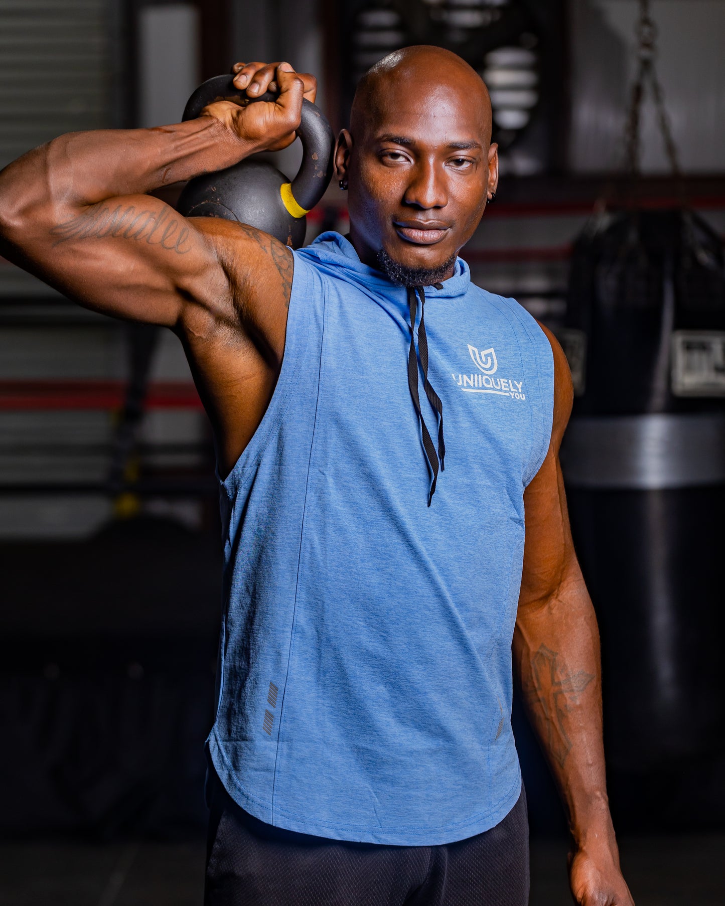 Men’s sky blue sleeveless workout hoodie, breathable athletic fabric, lightweight gym hoodie with slim fit