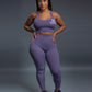 Purple Seamless workout set with cross-back sports bra and high-waisted leggings featuring butt lift design, waist-slimming fit, and smooth sculpting fabric
