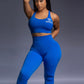 Royal  Blue seamless workout set with cross-back strappy sports bra and high-waisted leggings featuring butt lifting design, waist-slimming fit, and smooth sculpting fabric