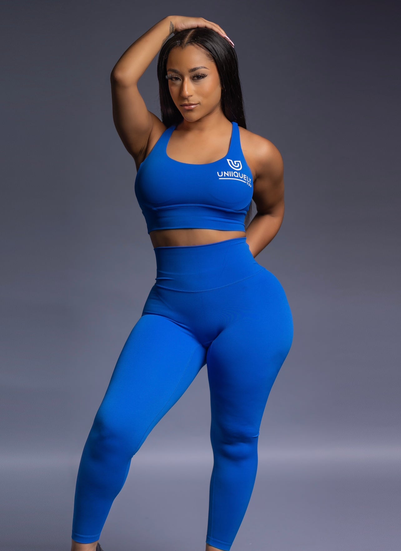 Royal  Blue seamless workout set with cross-back strappy sports bra and high-waisted leggings featuring butt lifting design, waist-slimming fit, and smooth sculpting fabric