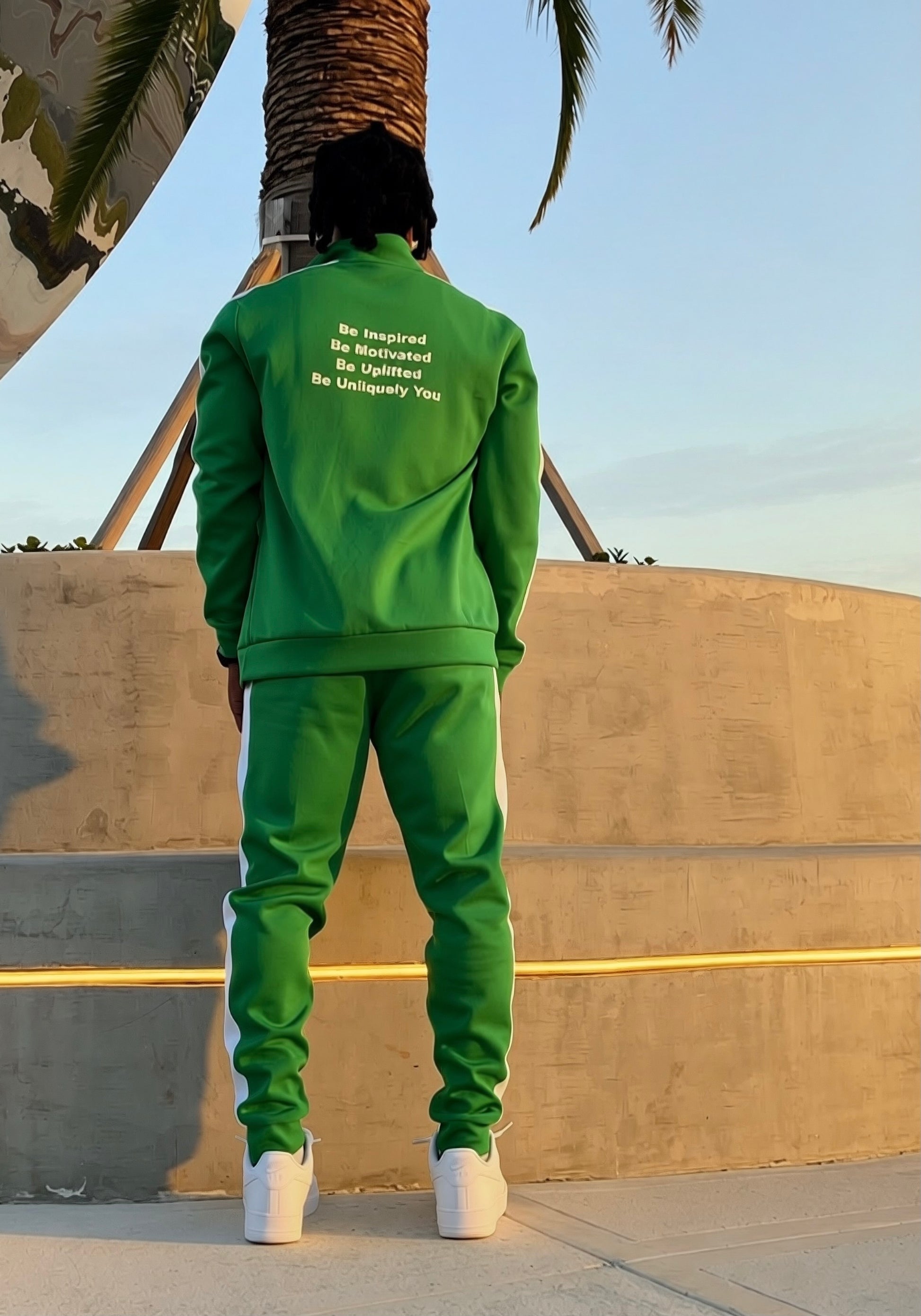 Men’s green tracksuit with white side stripes, athletic fit two-piece set with zip jacket and matching pants