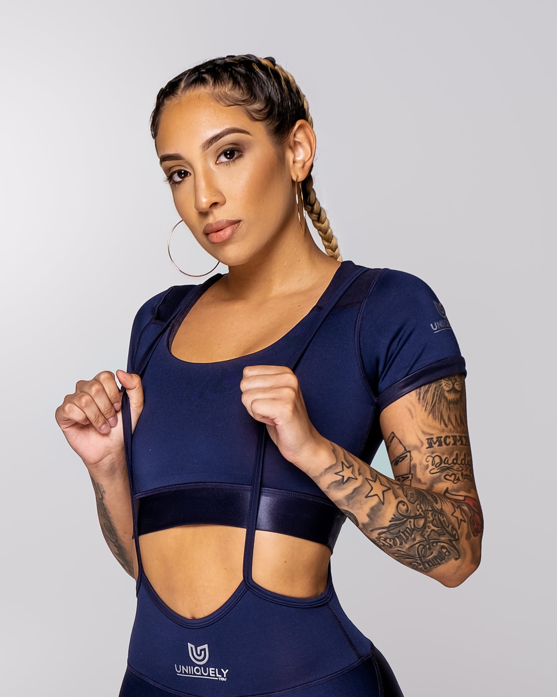 Women’s navy blue short sleeve cropped workout top, fitted athletic crop top with supportive stretch fabric and sleek design