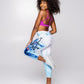 Women’s blue and white graphic print regular-waisted leggings with bold text design, fitted athletic leggings paired with pink strappy sports bra