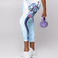 Women’s blue and white graphic print regular-waisted leggings with bold text design, fitted athletic leggings